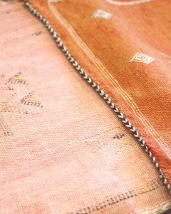 sabra cushion covers in orange and pink