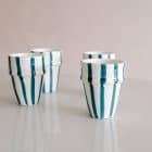 Elegant stripe ceramic storage pot for kitchen organisation. Perfect for storing spices, herbs, or small items with a stylish design. Ideal for modern and minimalist home decor.