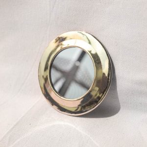 round brass mirror