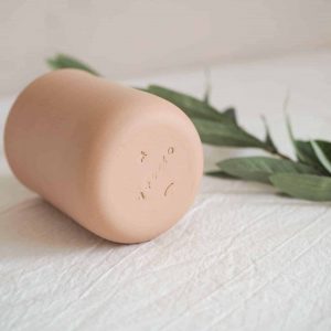 soft clay ceramic cup with make a stamp in the base we are nomads