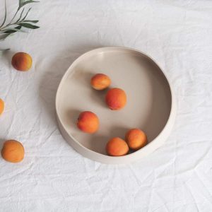 cream ceramic fruit bowl with glossy finish we are nomads