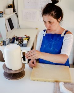 eva of eradu forming a teat pot in her studio we are nomads