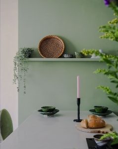 Sage green kitchen with marble worktop designed in chorlton manchester