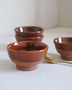 Small brown ceramic pinch bowl